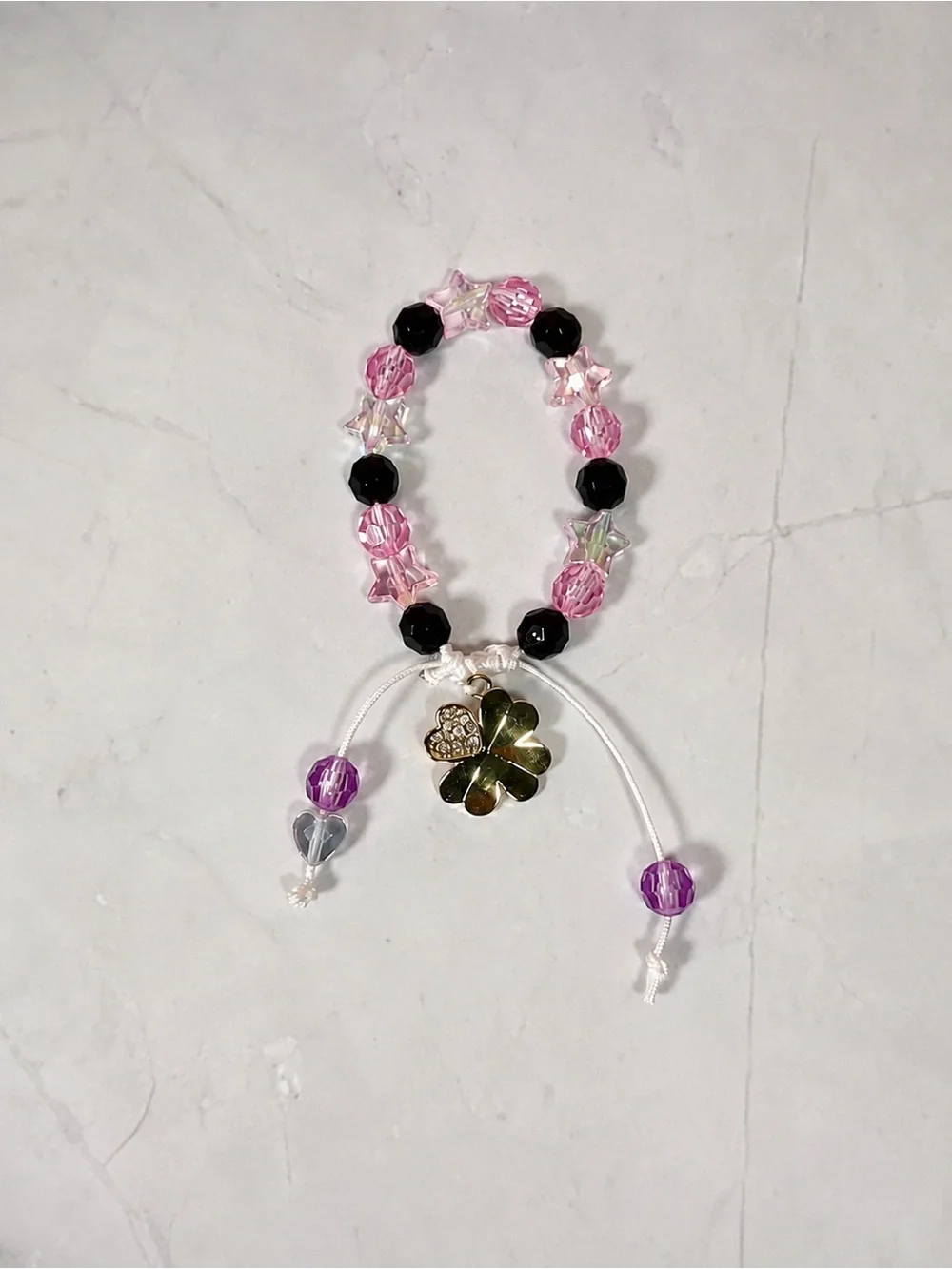 Pink & Black Star Bead bracelet with Gold Flower Charm